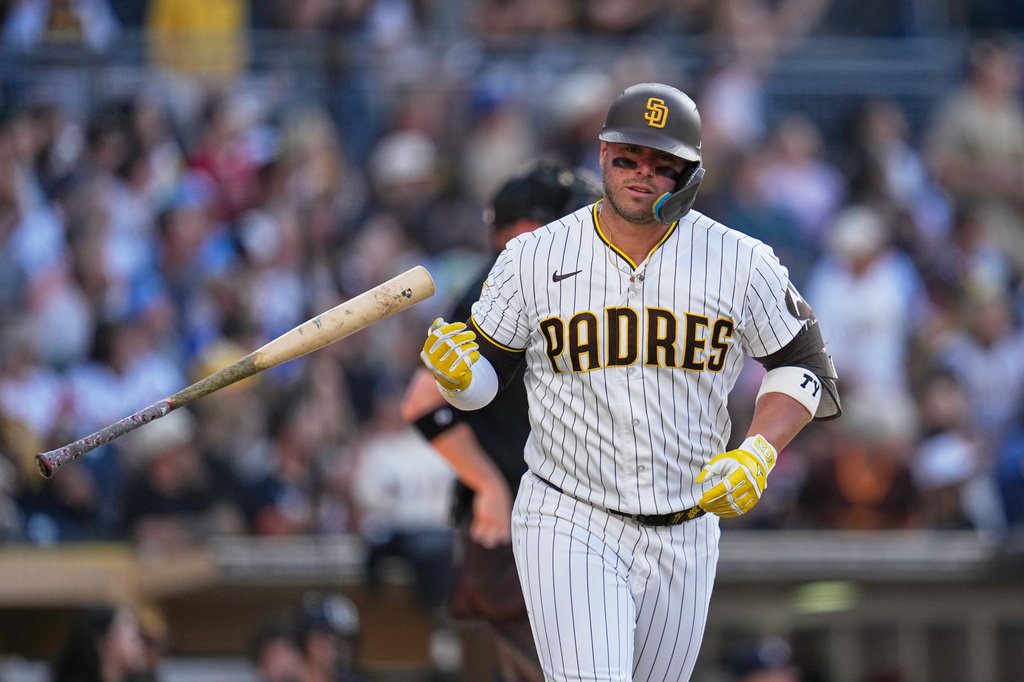 San Diego Padres' Ty France tosses his bat after hitting a home run during the third inning of a baseball game against the Atlanta Braves Wednesday, June 24, 2026, in San Diego. (AP Photo/Gregory Bull)