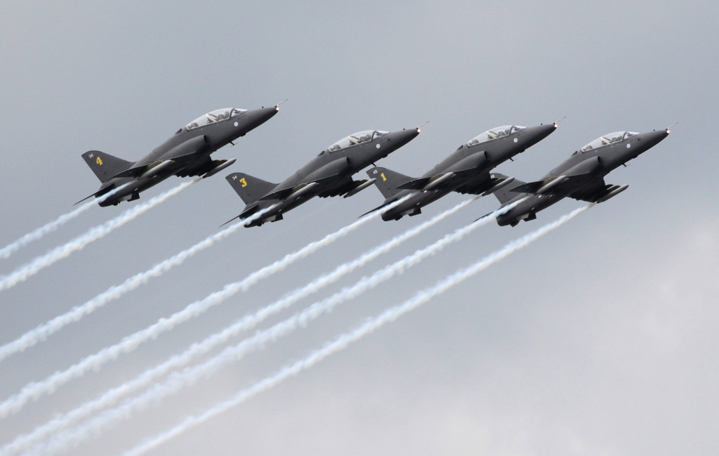 FILE - Finnish aerobatics group Midnight Hawks performs during a celebration marking the Russian air force's 100th anniversary in Zhukovsky, outside Moscow, Russia, on Aug. 11, 2012. (AP Photo/Misha Japaridze, File)
