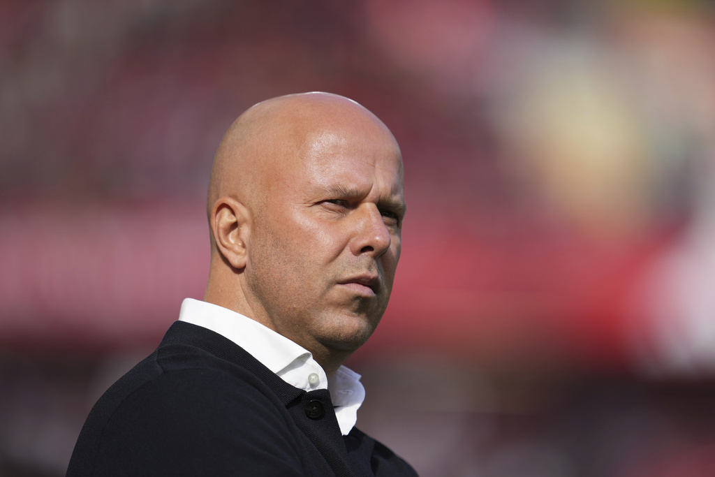 Liverpool's manager Arne Slot concentrates prior the English Premier League soccer match between FC Liverpool and FC Arsenal in Liverpool, England, Sunday, Aug. 31, 2025. (AP Photo/Jon Super)