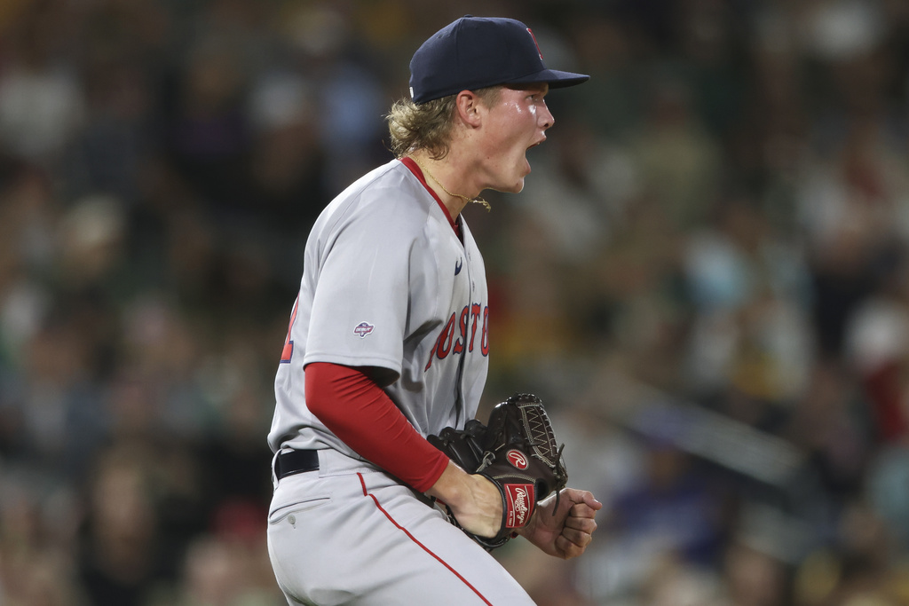 Boston Red Sox starting pitcher Connelly Early reacts after the final out of the fourth inning of a baseball game as he makes his major league debut against the Athletics, Tuesday, Sept. 9, 2025, in West Sacramento, Calif. (AP Photo/Scott Marshall)