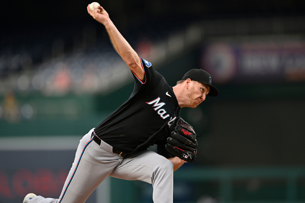 Miami Marlins staring pitcher Ryan Gusto throws during the first inning of a baseball game against the Washington Nationals, Monday, Aug. 31, 2026, in Washington. (AP Photo/John McDonnell)