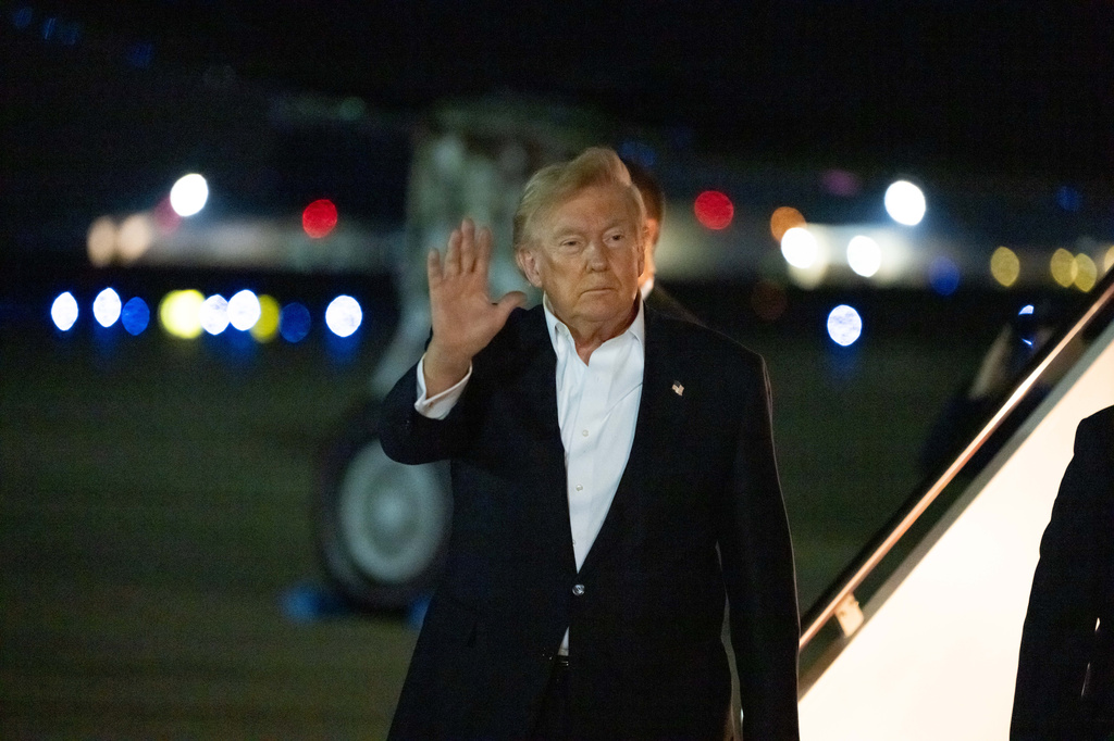 President Donald Trump waves as he arrives on Air Force One, Thursday, July 9, 2026, at Joint Base Andrews, Md. (AP Photo/Alex Brandon)
