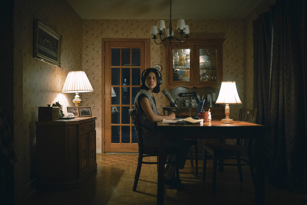 This image released by A24 shows Nina Kiri in a scene from "Undertone." (Dustin Rabin/A24 via AP)