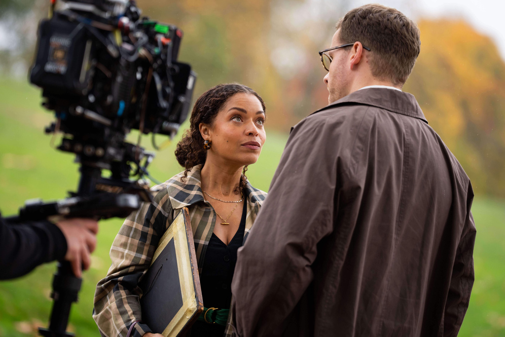 Antonia Thomas, left, and and Josh Dylan appear on the set of the Agatha Christie series "Tommy & Tuppence" in Beaconsfield, England on Wednesday, Oct. 29, 2025. (Photo by Scott A Garfitt/Invision/AP)