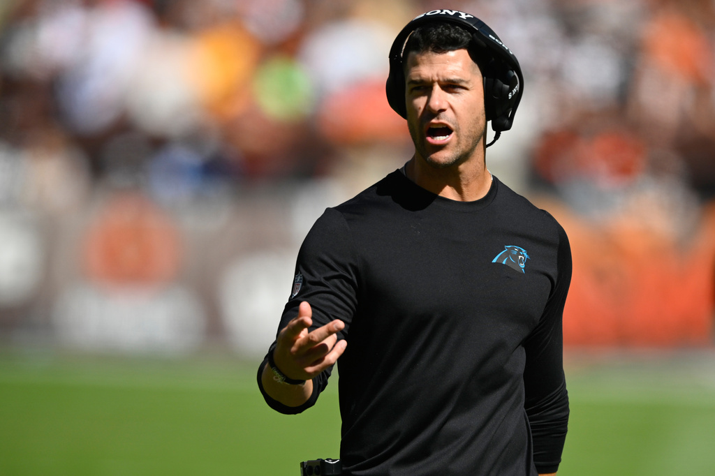 Carolina Panthers head coach Dave Canales motions towards the field against the Cleveland Browns during the first half of an NFL football game in Cleveland, Sunday, Sept. 27, 2026. (AP Photo/David Richard)