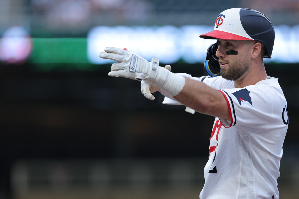 Minnesota Twins' Kody Clemens celebrates hitting a single during the fifth inning of a baseball game against the Cleveland Guardians, Tuesday, July 7, 2026, in Minneapolis. (AP Photo/Bailey Hillesheim)