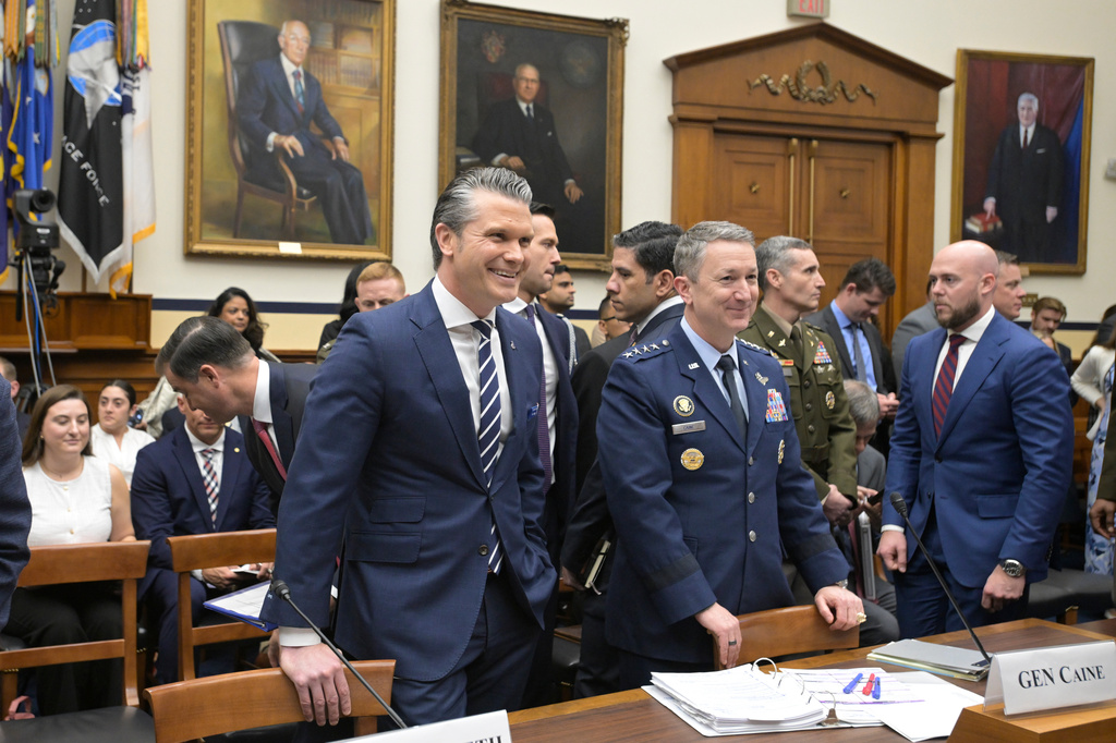 Secretary of Defense Pete Hegseth, left, and Gen. Dan Caine, Chairman of the Joint Chiefs of Staff, appear before a House Committee on Armed Services business meeting on the Department of Defense Fiscal Year 2027, on Capitol Hill, Wednesday, April 29, 2026, in Washington. (AP Photo/Rod Lamkey Jr.)