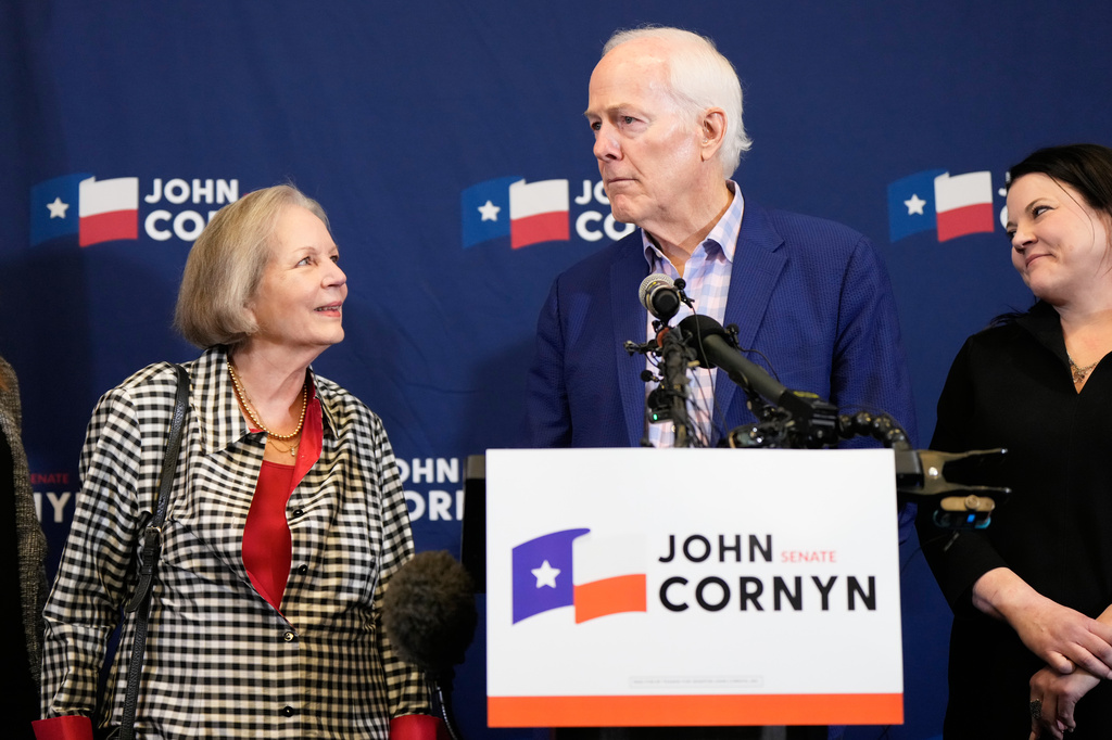 Sen. John Cornyn, R-Texas, center right, speaks during a primary runoff election night event after losing the Republican party's nomination Tuesday, May 26, 2026, in Austin. (AP Photo/Ashley Landis)