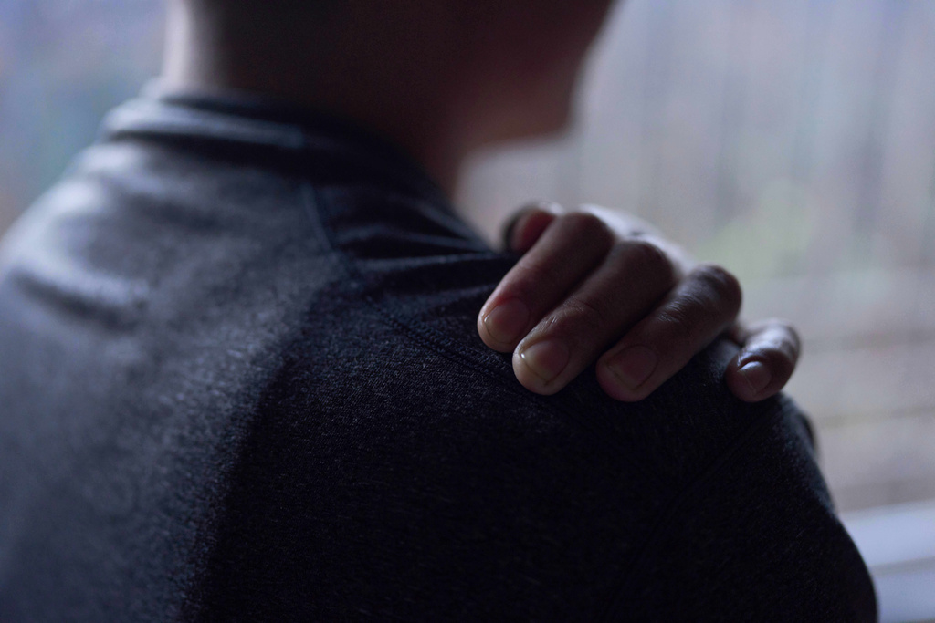 A Tibetan living in exile gets emotional as he shares his story during an interview in Kathmandu, Nepal, April 14, 2025. (AP Photo/Niranjan Shrestha)