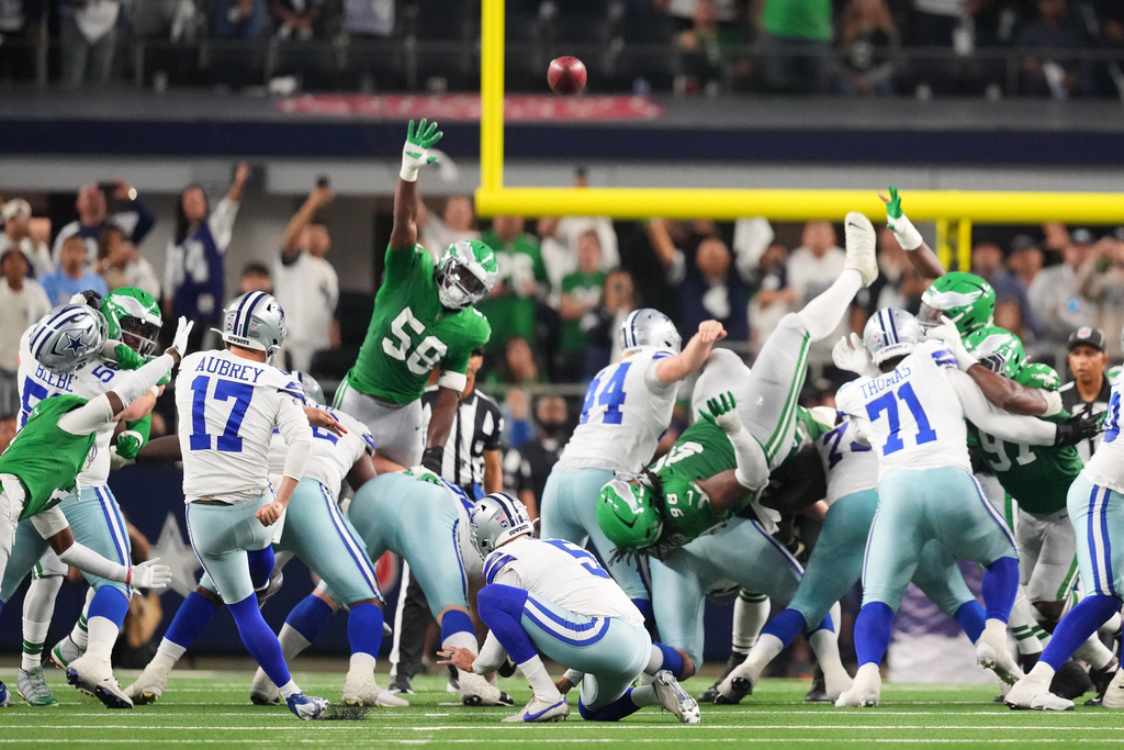 Dallas Cowboys kicker Brandon Aubrey (17) kicks the game-winning field goal during the second half of an NFL football game against the Philadelphia Eagles, Sunday, Nov. 23, 2025, in Arlington, Texas. (AP Photo/Julio Cortez)