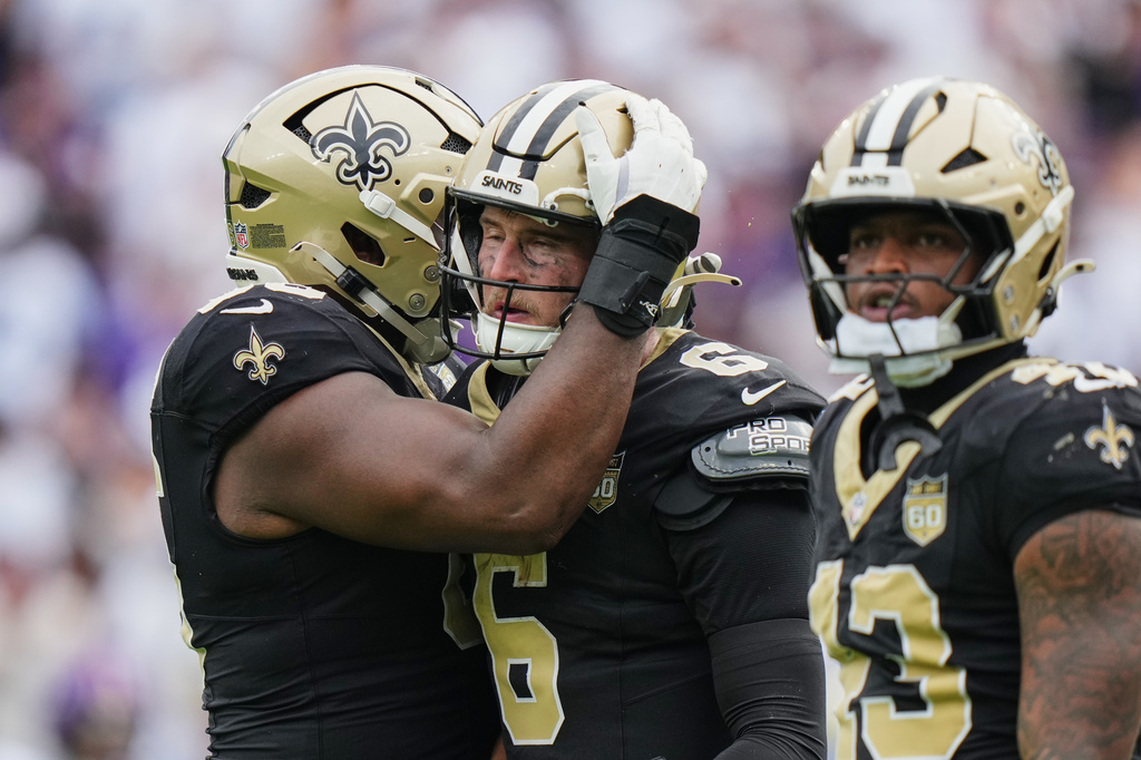 New Orleans Saints quarterback Tyler Shough (6) reacts after scoring the winning touchdown on fourth down in the second half of an NFL football game against the Baltimore Ravens in Baltimore, Sunday, Sept. 20, 2026. (AP Photo/Stephanie Scarbrough)