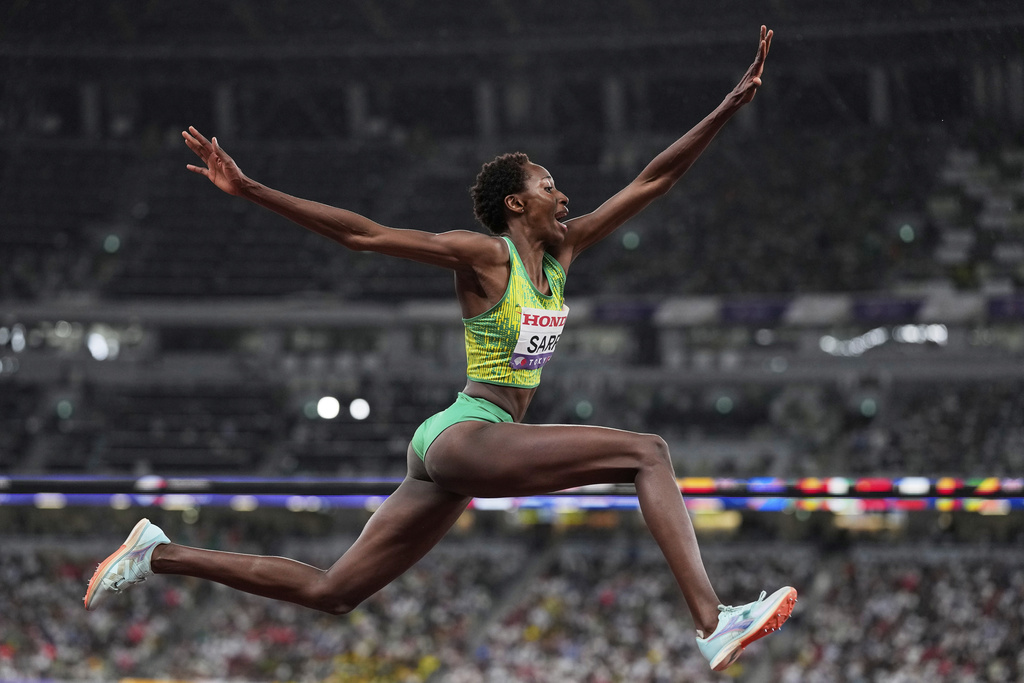 Senegal's Saly Sarr makes an attempt in the women's triple jump final at the World Athletics Championships in Tokyo, Thursday, Sept. 18, 2025. (AP Photo/Matthias Schrader)