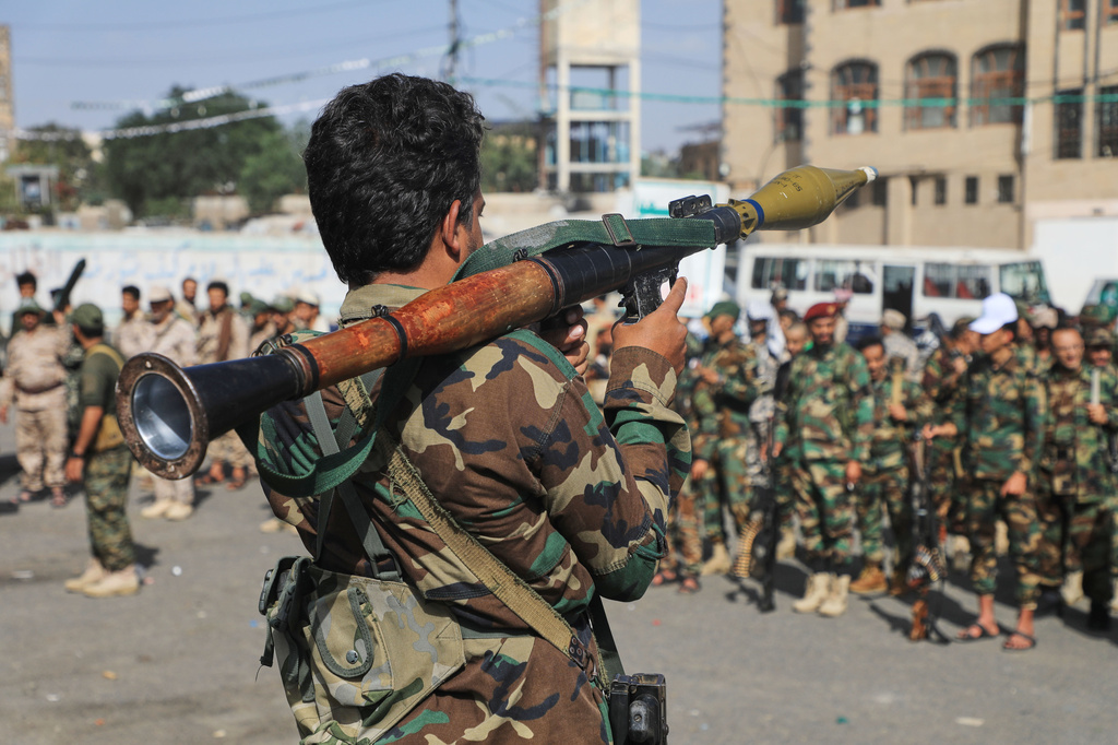 A fighter with Yemen’s Houthi rebels carries a rocket-propelled grenade launcher as they march during a mobilization campaign in Sanaa, Yemen, Thursday, Sept. 10, 2026. (AP Photo)
