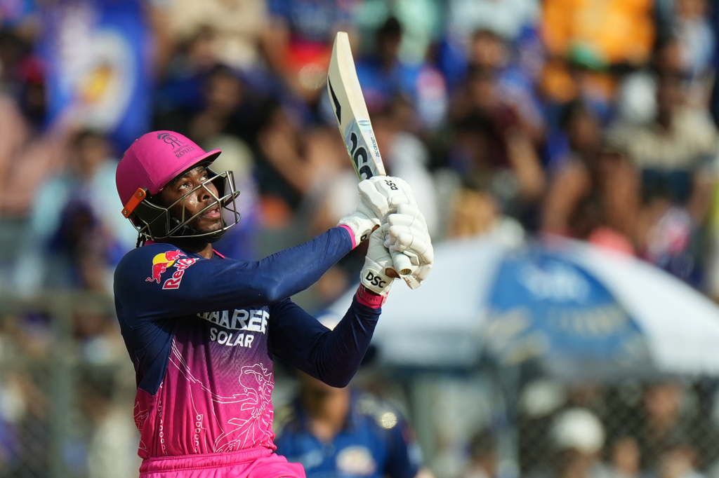 Rajasthan Royals' Jofra Archer hits a six during the Indian Premier League cricket match between Mumbai Indians and Rajasthan Royals in Mumbai, India, Sunday, May 24, 2026. (AP Photo/Ajit Solanki)