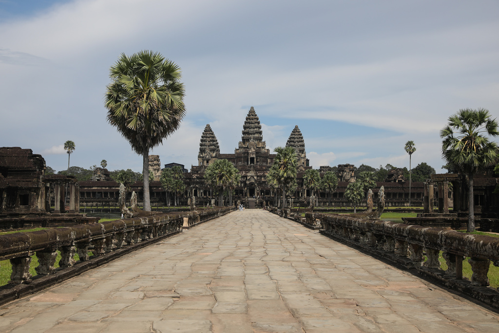 The mostly empty entrance way to the main section of the ancient Angkor Wat temple in Siem Reap, Cambodia on Sept. 16, 2022. (AP Photo/Anton L. Delgado)