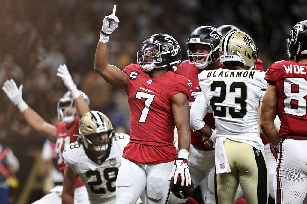 Atlanta Falcons running back Bijan Robinson (7) celebrates after scoring against the New Orleans Saints during the first half of an NFL football game in New Orleans, Monday, Oct. 5, 2026. (AP Photo/Ella Hall)