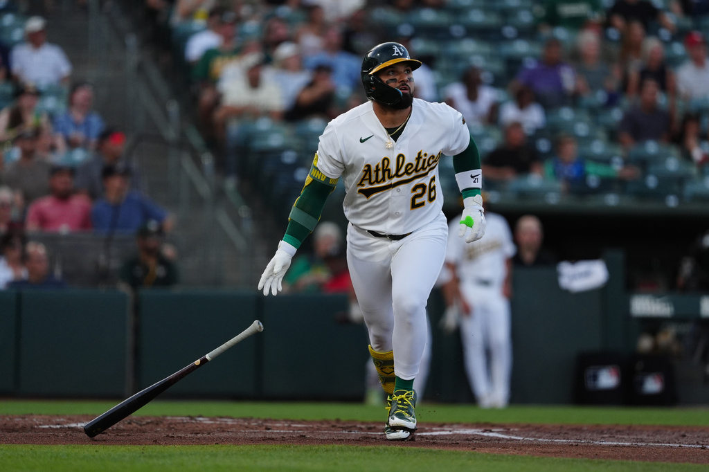 Athletics' Carlos Cortes watches his two-run home run in the second inning of a baseball game against the Minnesota Twins Tuesday, Aug. 25, 2026, in West Sacramento, Calif. (AP Photo/Alan Greth)