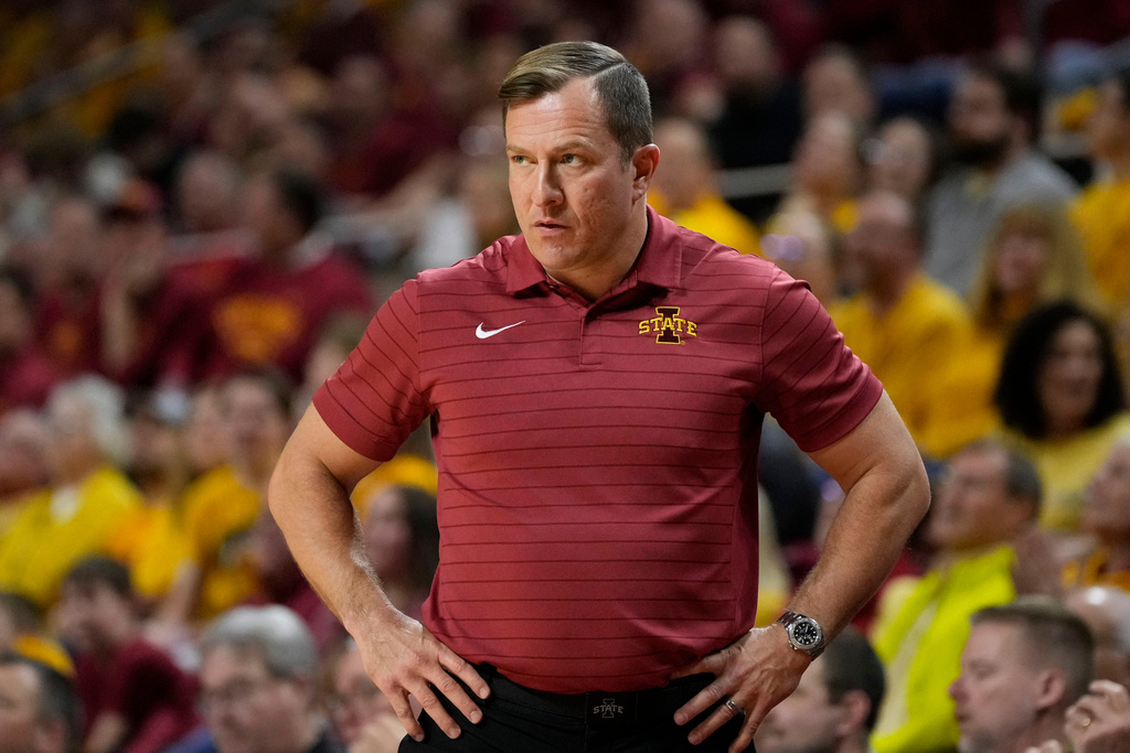 Iowa State head coach T.J. Otzelberger watches from the bench during the first half of an NCAA college basketball game against Iowa State, Saturday, March 7, 2026, in Ames, Iowa. (AP Photo/Charlie Neibergall)