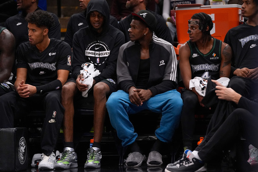 Minnesota Timberwolves guard Anthony Edwards, center, watches play during the first half of an NBA basketball game against the Denver Nuggets, Monday, Oct. 27, 2025, in Minneapolis. (AP Photo/Abbie Parr) Minnesota Timberwolves guard Anthony Edwards, center, watches play during the first half of an NBA basketball game against the Denver Nuggets, Monday, Oct. 27, 2025, in Minneapolis. (AP Photo/Abbie Parr)