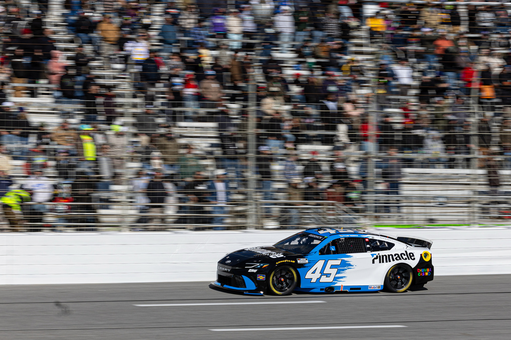 Tyler Reddick drives on the track during a NASCAR Cup Series auto race, Sunday, Feb. 22, 2026, in Hampton, Ga. (AP Photo/Colin Hubbard)