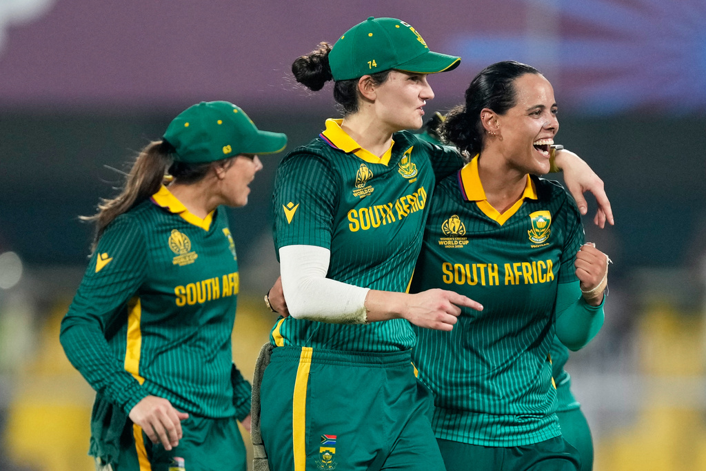 South Africa's players celebrate after winning the ICC Women's Cricket World Cup first semifinal match between England and South Africa at Barsapara Cricket Stadium in Guwahati, India, Thursday, Oct. 29, 2025. (AP Photo/Anupam Nath)