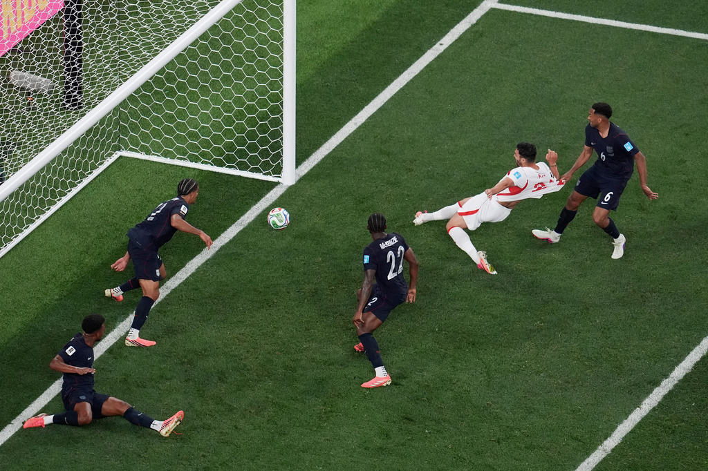 Turkey's Kaan Ayhan, second from right, scores their third goal as United States' Auston Trusty (6) defends and United States' Mark McKenzie (22) and United States' Miles Robinson (12) look on during the second half of a World Cup Group D soccer match in Inglewood, Calif., near Los Angeles, Thursday, June 25, 2026. (AP Photo/Marcio J. Sanchez)