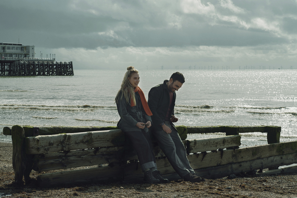 This image released by Apple TV+ shows Brett Goldstein, right, and Imogen Poots in a scene from "All of You." (Tereza Cervenova/Apple TV+ via AP)
