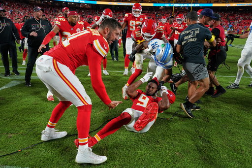 Detroit Lions defensive back Brian Branch (32) fights with Kansas City Chiefs wide receiver JuJu Smith-Schuster (9) while be held back by Chiefs' James Winchester, left, and Isiah Pacheco (10) following an NFL football game Sunday, Oct. 12, 2025, in Kansas City, Mo. (AP Photo/Ed Zurga) Detroit Lions defensive back Brian Branch (32) fights with Kansas City Chiefs wide receiver JuJu Smith-Schuster (9) while be held back by Chiefs' James Winchester, left, and Isiah Pacheco (10) following an NFL football game Sunday, Oct. 12, 2025, in Kansas City, Mo. (AP Photo/Ed Zurga)