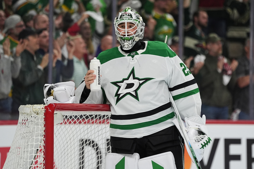 Dallas Stars goaltender Jake Oettinger (29) waits for play to resume after a goal scored by Minnesota Wild left wing Marcus Johansson (90) during the first period of Game 3 in the first-round of the NHL Stanley Cup hockey playoffs Wednesday, April 22, 2026, in St. Paul, Minn. (AP Photo/Abbie Parr)