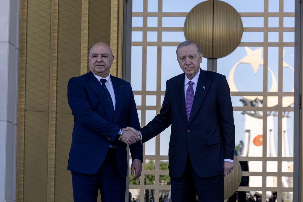 Turkish President Recep Tayyip Erdogan, right, shakes hands with his Lebanese counterpart Joseph Aoun before their meeting at the presidential palace in Ankara, Thursday, July 30, 2026. (Ugur Yildirim/DIA Photo via AP)