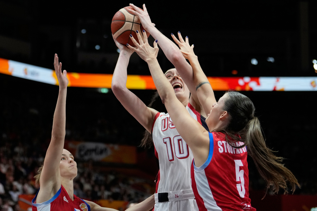 Czechia's Natalie Stoupalova guards Breanna Stewart, of the United States, during the Women's Basketball World Cup match between the United States and Czechia in Berlin, Monday, Sept. 7, 2026. (AP Photo/Ebrahim Noroozi)