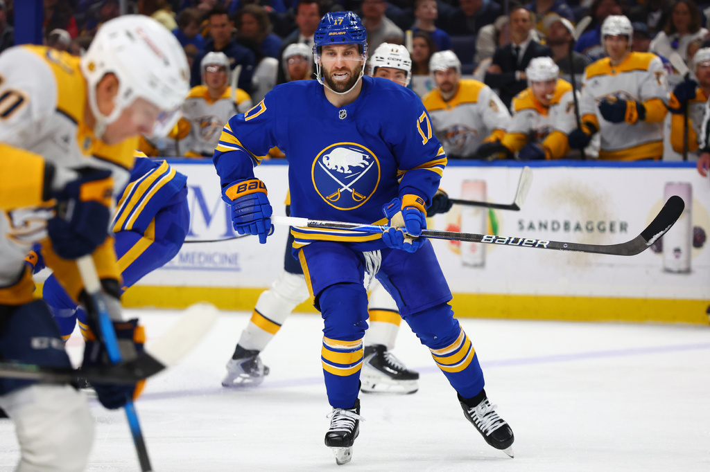 FILE - Buffalo Sabres left wing Jason Zucker (17) skates up ice during the second period of an NHL hockey game against the Nashville Predators, March 7, 2026, in Buffalo, N.Y. (AP Photo/Jeffrey T. Barnes, File)
