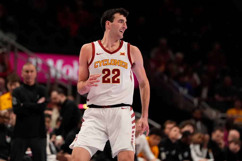 Iowa State's Milan Momcilovic celebrates after making a 3-point basket during the second half of an NCAA college basketball game against Arizona State in the second round of the Big 12 Conference tournament Wednesday, March 11, 2026, in Kansas City, Mo. (AP Photo/Charlie Riedel)