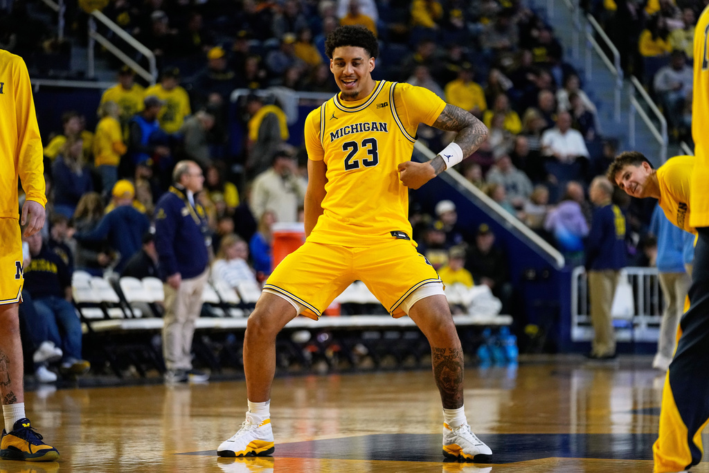 Michigan forward Yaxel Lendeborg dances during half time of an NCAA college basketball game against McNeese, Monday, Dec. 29, 2025, in Ann Arbor, Mich. (AP Photo/Ryan Sun)