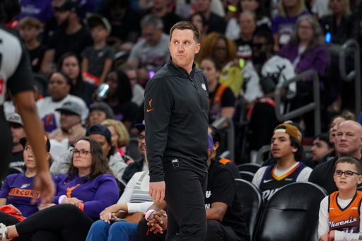 Minnesota Lynx acting head coach Eric Thibault, center, looks on during the first half of Game 4 of a WNBA basketball playoff semifinals series against the Phoenix Mercury, Sunday, Sept. 28, 2025, in Phoenix. (AP Photo/Samantha Chow) Minnesota Lynx acting head coach Eric Thibault, center, looks on during the first half of Game 4 of a WNBA basketball playoff semifinals series against the Phoenix Mercury, Sunday, Sept. 28, 2025, in Phoenix. (AP Photo/Samantha Chow)