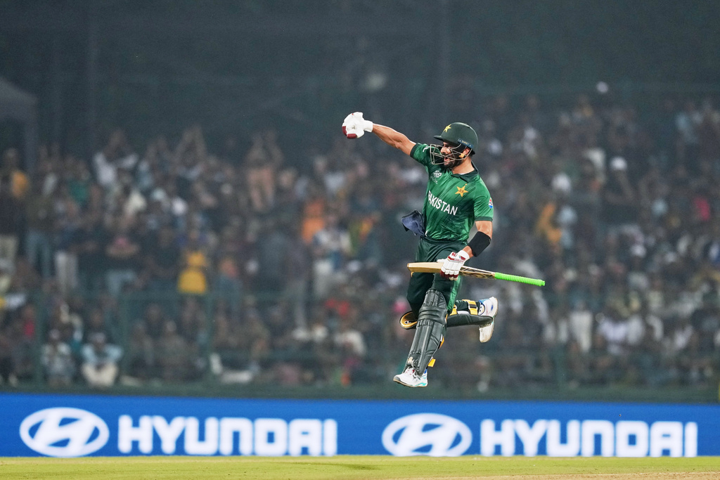 Pakistan's Sahibzada Farhan celebrates his century during the T20 World Cup cricket match between Pakistan and Sri Lanka in Pallekele, Sri Lanka, Saturday, Feb. 28, 2026. (AP Photo/Eranga Jayawardena)
