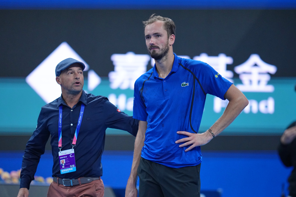 Daniil Medvedev, of Russia, looks on after being disqualified during a semi final match against Novak Djokovic, of Serbia at the China Open tennis tournament in Beijing, Monday, Oct. 5, 2026. (AP Photo/Achmad Ibrahim)