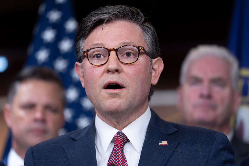 Speaker of the House Mike Johnson, R-La., and the GOP leadership talk to reporters about their positions on funding the government as the shutdown reaches the third week without a solution in sight, at the Capitol in Washington, Wednesday, Oct. 15, 2025. (AP Photo/J. Scott Applewhite)