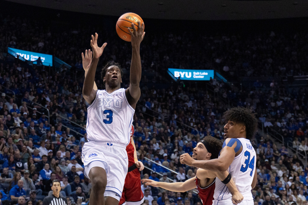 BYU forward AJ Dybantsa (3) drives to the basket against Eastern Washington during the first half of an NCAA basketball game, Monday, Dec. 22, 2025, in Provo, Utah. (AP Photo/Rob Gray)