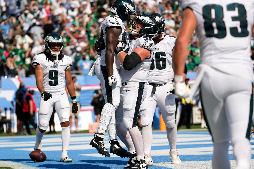 Philadelphia Eagles wide receiver Darius Cooper (80) celebrates with teammates after catching a touchdown pass during the second half of an NFL football game against the Tennessee Titans, Sunday, Sept. 20, 2026, in Nashville, Tenn.(AP Photo/George Walker IV)