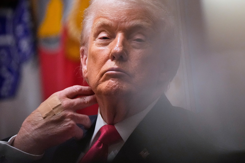 President Donald Trump listens during a Cabinet meeting at the White House, Tuesday, Dec. 2, 2025, in Washington. (AP Photo/Julia Demaree Nikhinson)