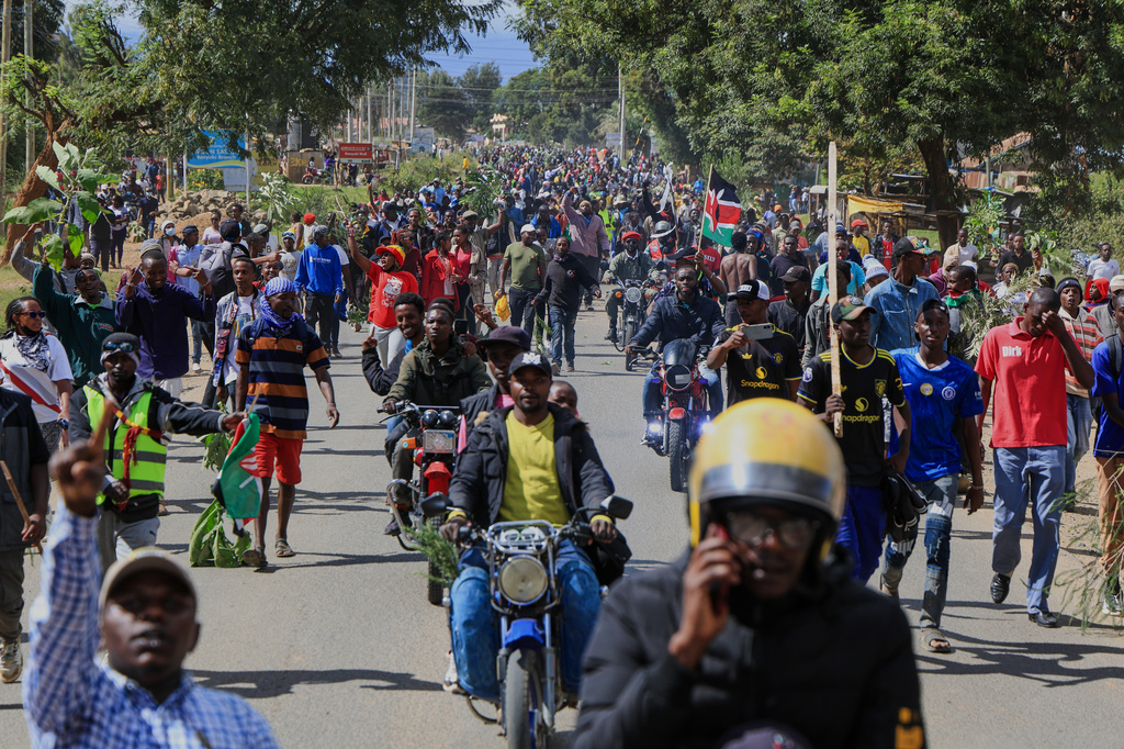 Protesters demonstrate against a proposed Ebola quarantine center to be established by the United States at Laikipia Air Base in Nanyuki, Kenya, Monday, June 1, 2026. (AP Photo/Andrew Kasuku)