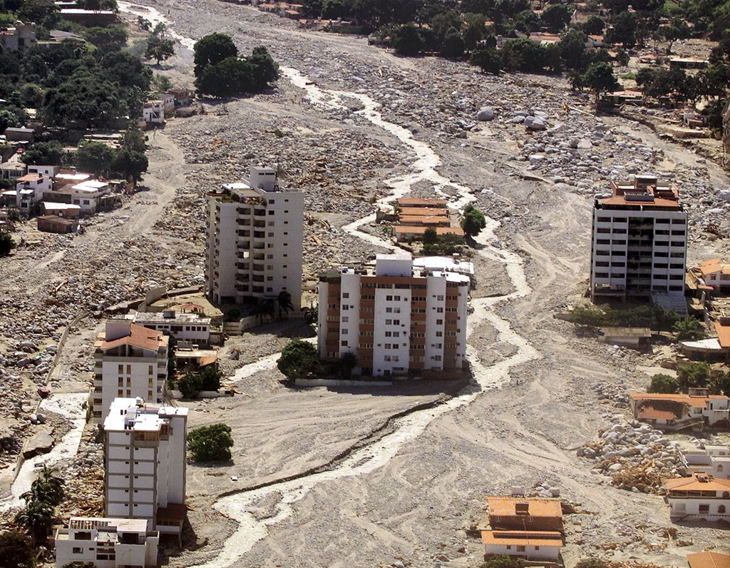 FILE - The flood ravaged neighborhood of Los Corales, in Vargas state just north of the capital Caracas, Dec. 19, 1999. (AP Photo/Ricardo Mazalan, File)