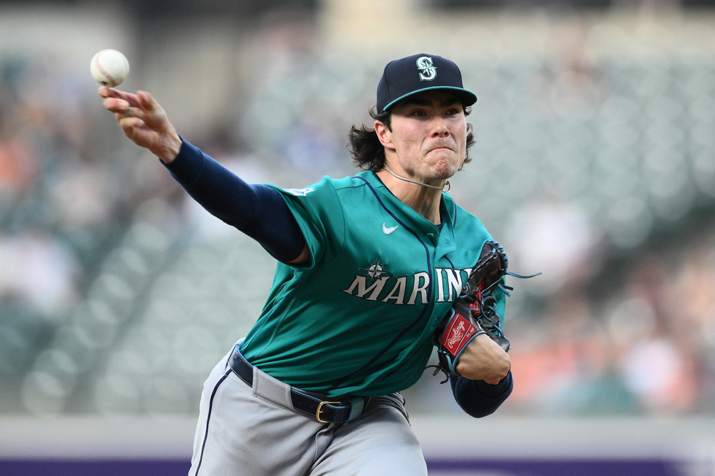 Seattle Mariners pitcher Bryan Woo throws during the first inning of a baseball game against the Baltimore Orioles, Thursday, June 11, 2026, in Baltimore. (AP Photo/Nick Wass)