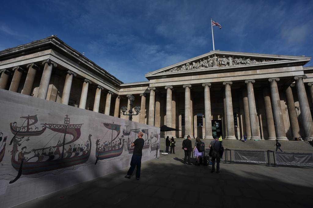 A poster of the Bayeux Tapestry is displayed outside the British Museum in London, Monday, Sept. 7, 2026. (AP Photo/Kin Cheung)