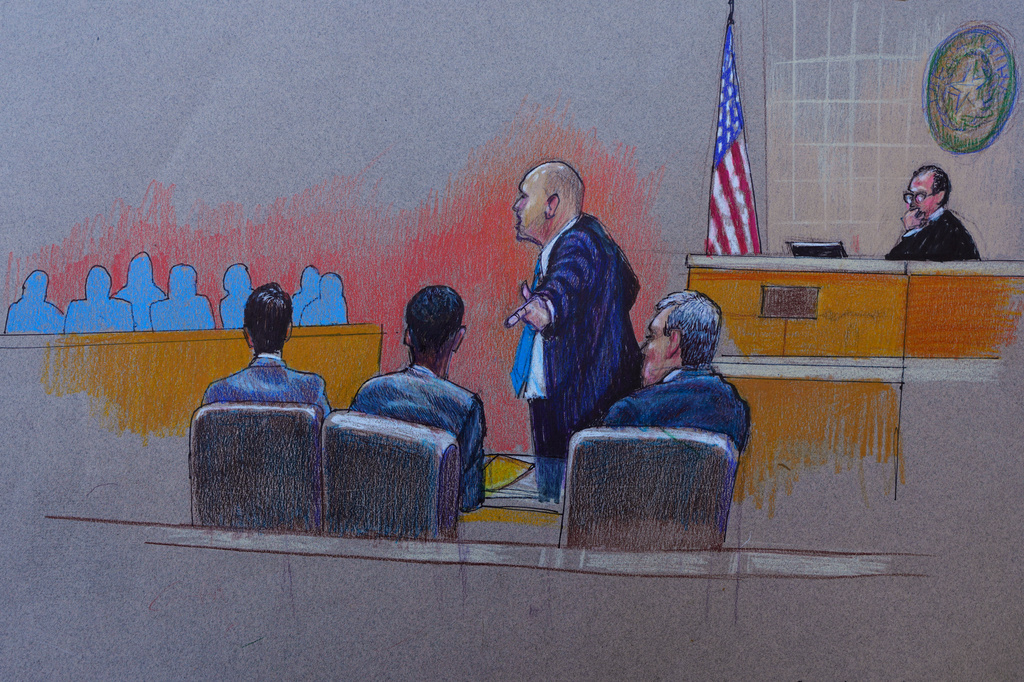 A courtroom sketch shows the district attorney pointing at Karmelo Anthony, center, at the defense table in opening arguments Thursday, June 4, 2026, in McKinney, Texas, during the trial of a teen accused of fatally stabbing another during a track meet in suburban Dallas last year. (Pat Lopez via AP)