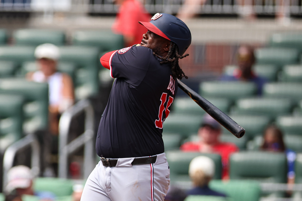 Washington Nationals' Josh Bell hits a solo home run in the fourth inning of a baseball game against the Atlanta Braves, Wednesday, Sept. 24, 2025, in Atlanta. (AP Photo/Colin Hubbard)