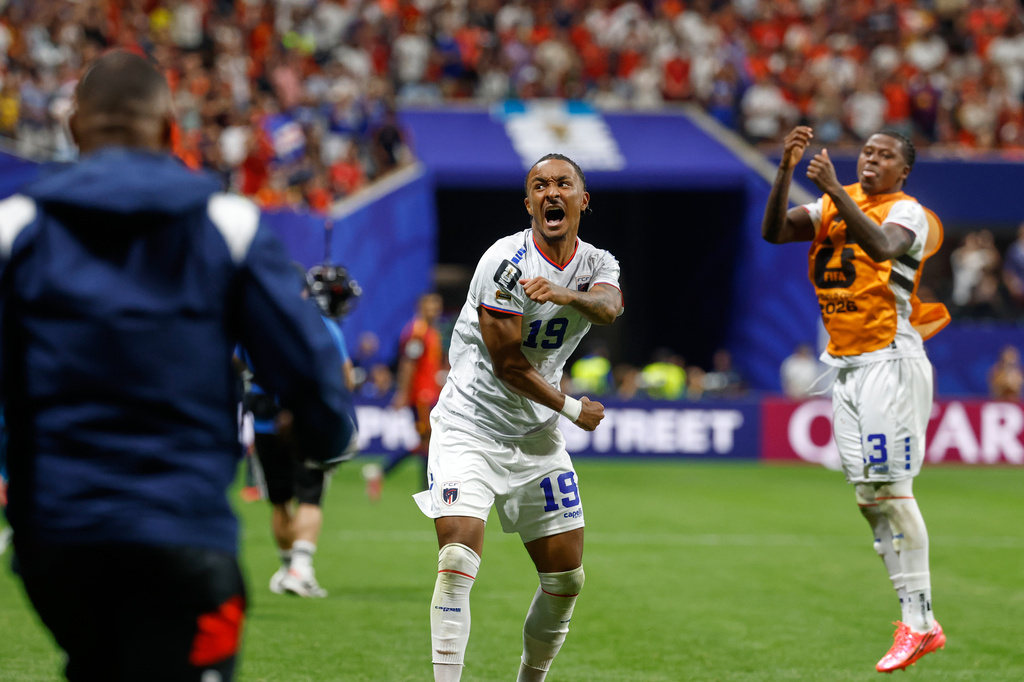 Cabo Verde's Dailon Livramento, center, and Cabo Verde's Sidny Lopes Cabral celebrate after the World Cup Group H soccer match between Spain and Cape Verde in Atlanta, Monday, June 15, 2026. (AP Photo/Erik S. Lesser)