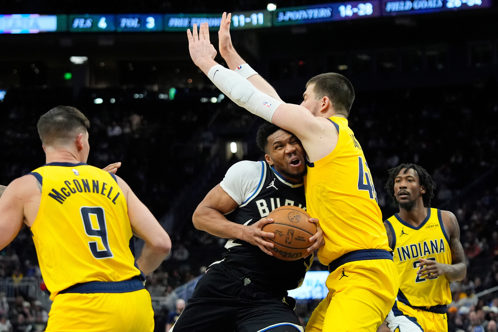 Milwaukee Bucks' Giannis Antetokounmpo drives to the basket against Indiana Pacers' Ivica Zubac during the second half of an NBA basketball game, Sunday, March 15, 2026, in Milwaukee. (AP Photo/Aaron Gash)