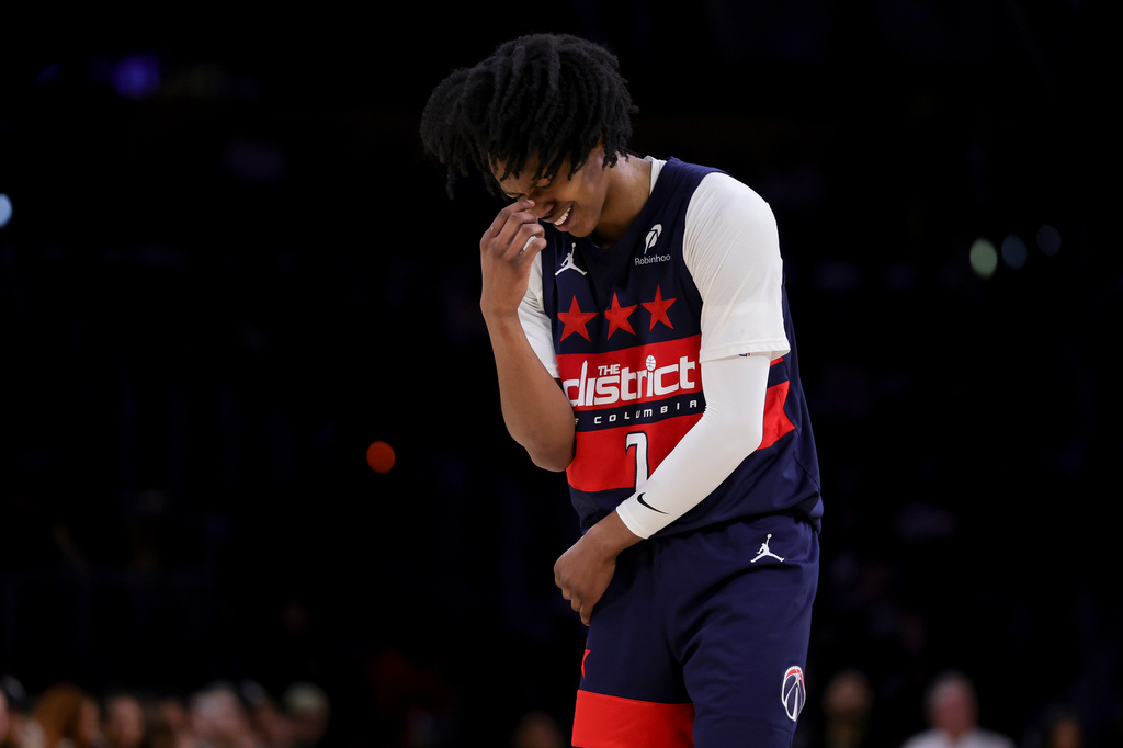 Washington Wizards guard Bub Carrington reacts during the first half of an NBA basketball game against the Los Angeles Lakers Monday, March 30, 2026, in Los Angeles. (AP Photo/Ryan Sun)